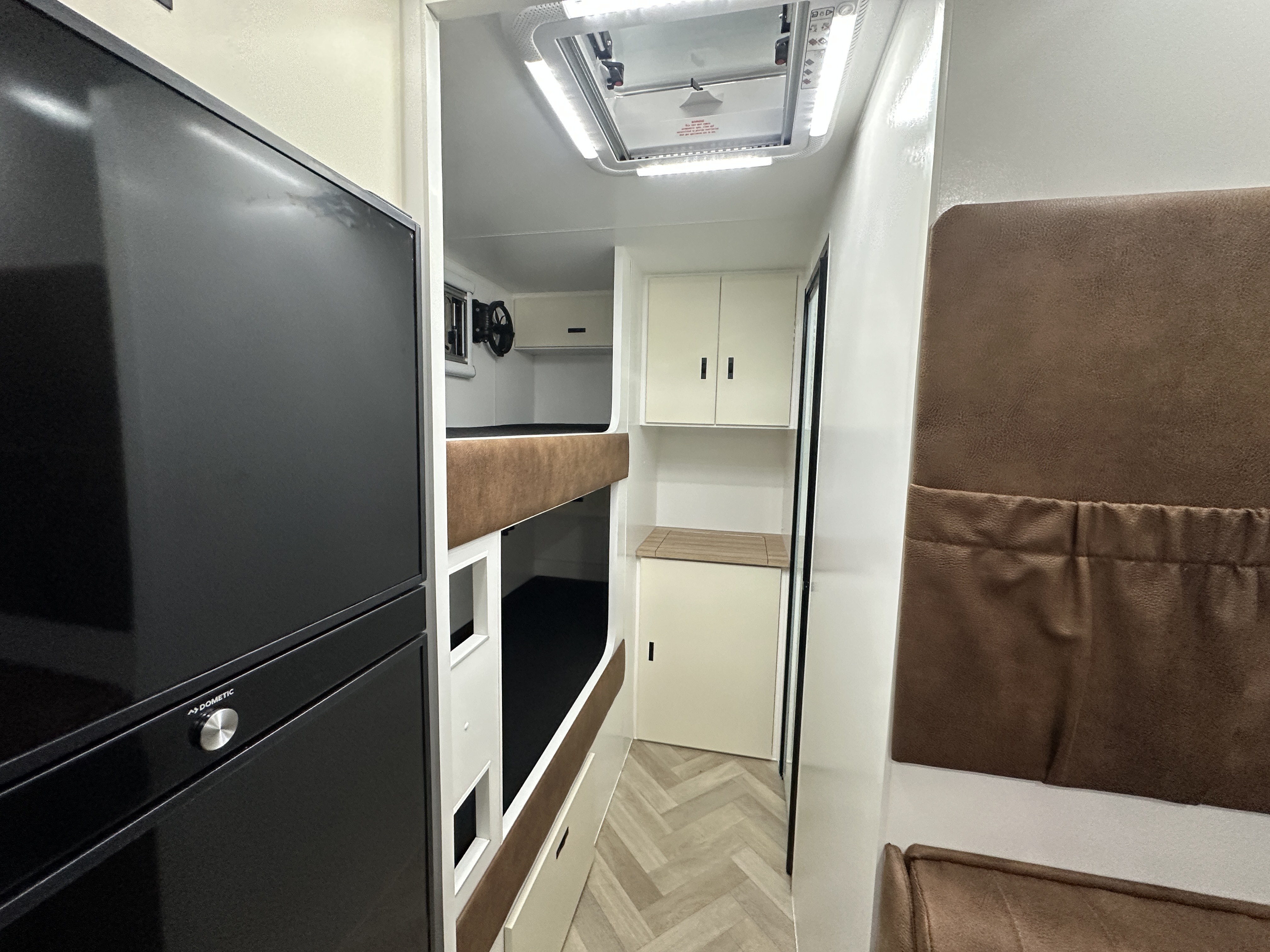 Riverland Family caravan modern interior with comfortable seating and entertainment system