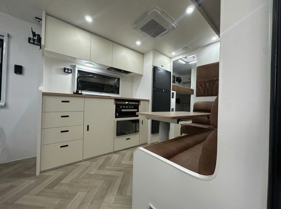 Riverland Caravans luxury interior featuring premium timber finishes, modern appliances and comfortable living space